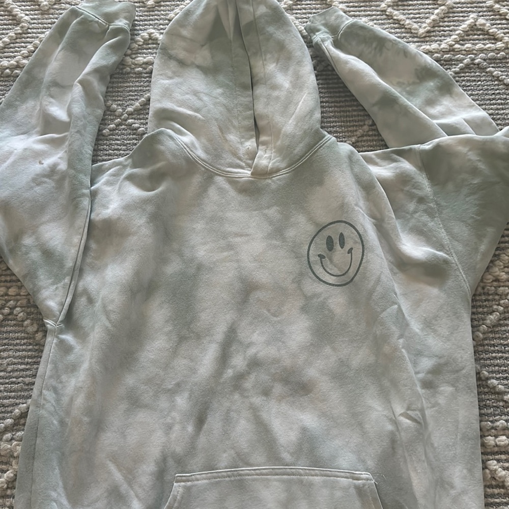 smiley face sweat shirt